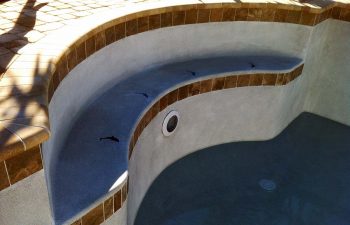 backyard swimming pool under construction - installed vinyl liner